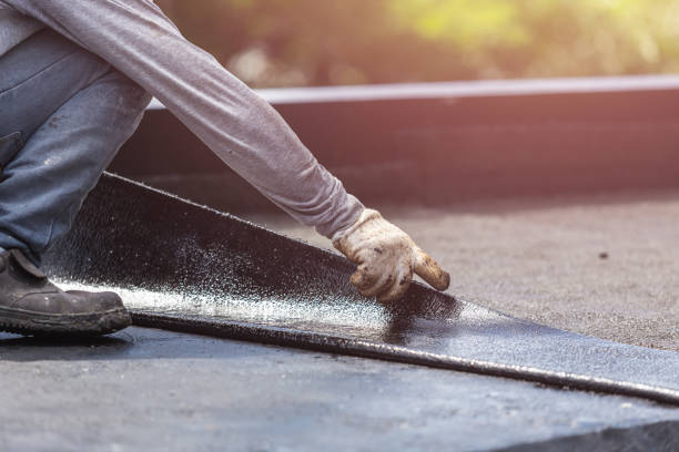Professional Basement Waterproofing technician working in Rogers, MN